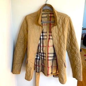 Burberry jacket in a traditional tan color.